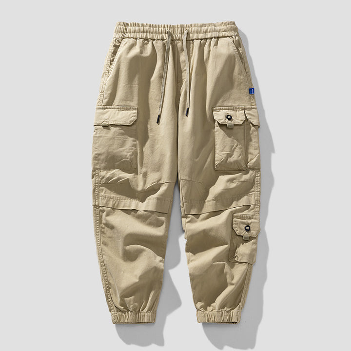 Herren Leichte Canvas-Cargohose im Joggerstil mit elastischem Bund, segmentierten Kniepaneelen und verdeckten Klappentaschen Echo Archiv