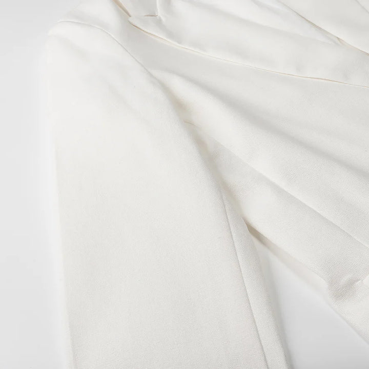 Damen unstrukturierter Longblazer mit fallendem Revers, leichter Stretchqualität und Pattentaschen – Célinea
