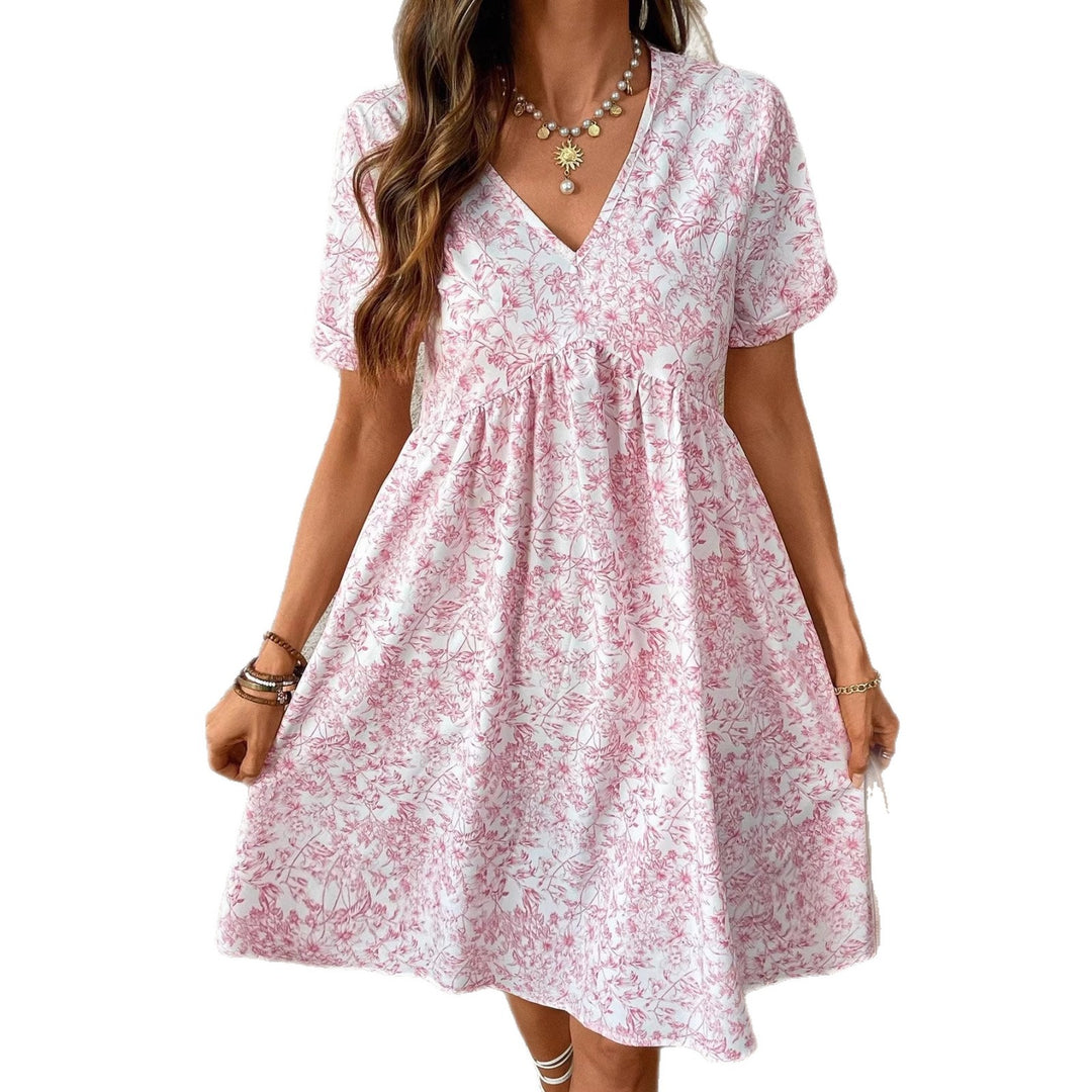 Damen Sommerliches Kleid mit floralem Muster und V-Ausschnitt Echo Archiv