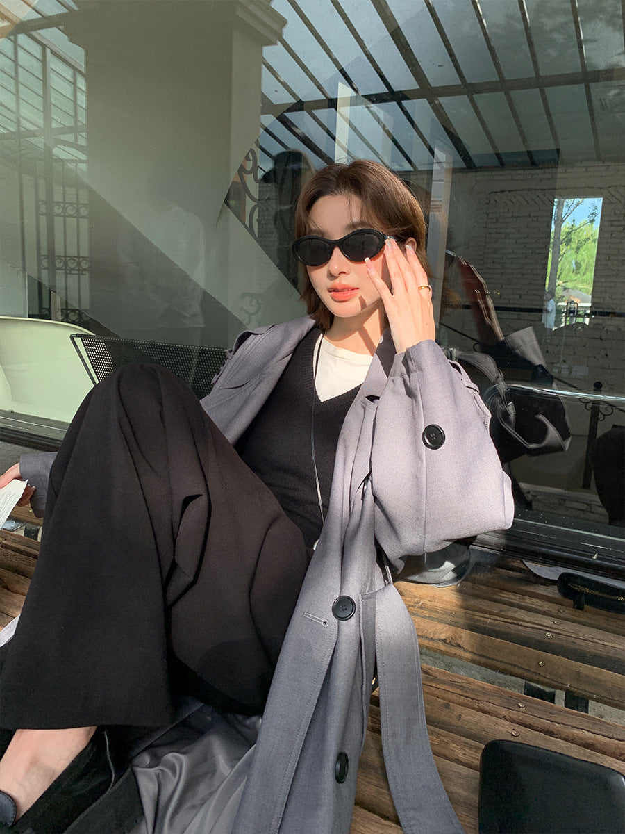 Damen Langer Trenchcoat im Oversize‑Look mit Bindegürtel und Schulterpatten Echoarchiv
