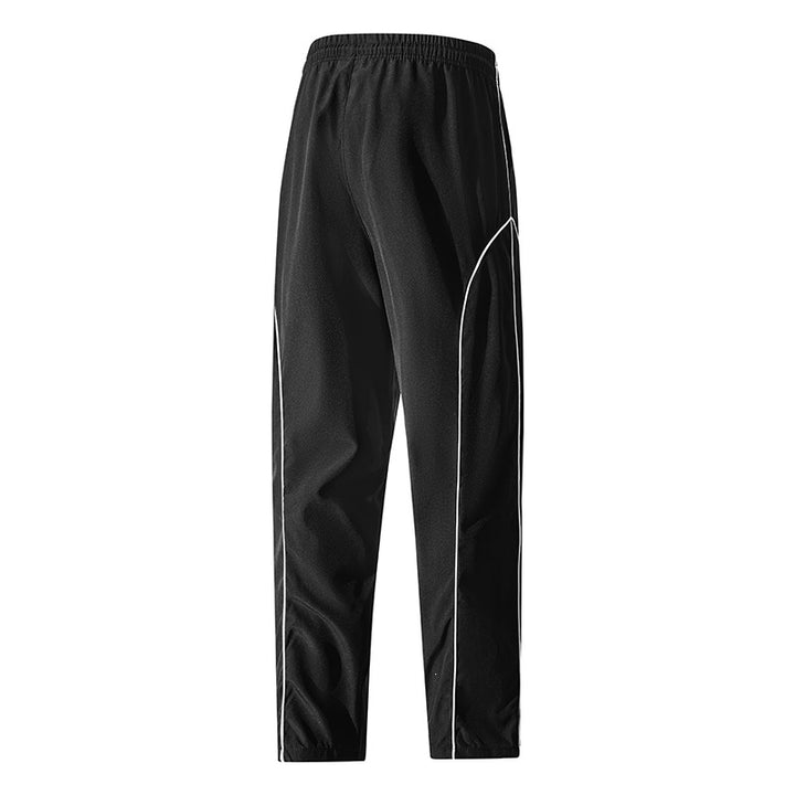 Herren Sportliche tapered Trainingshose mit elastischem Bund, Tunnelzug & Kontrastpaspel Echo Archiv