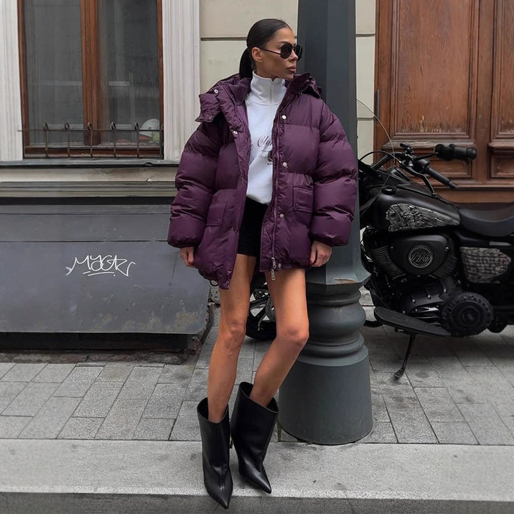Damen Oversize Steppjacke mit Kapuze und wattierter Thermofütterung Echoarchiv