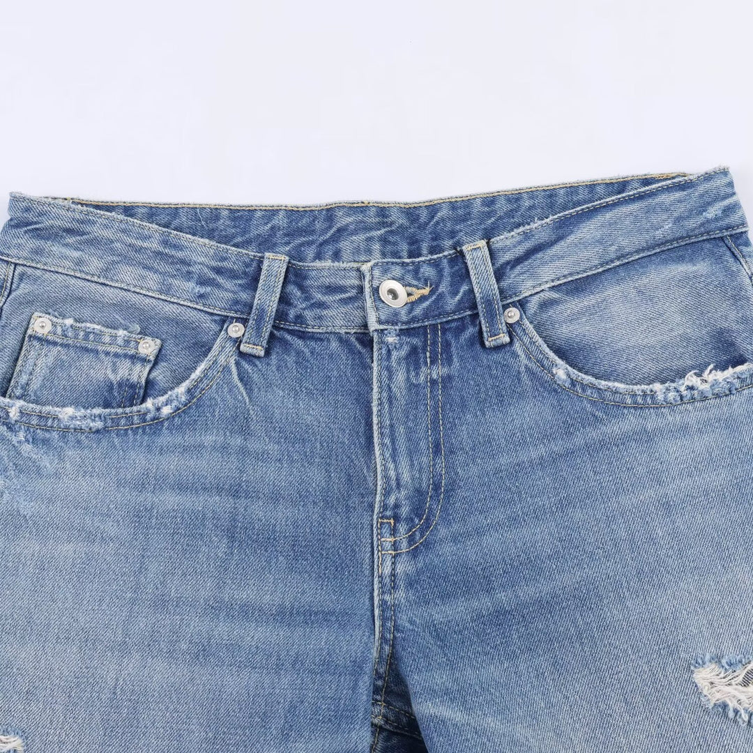 Damen Flared Jeans mit Destroyed-Effekten und Fransenabschlüssen Echo Archiv
