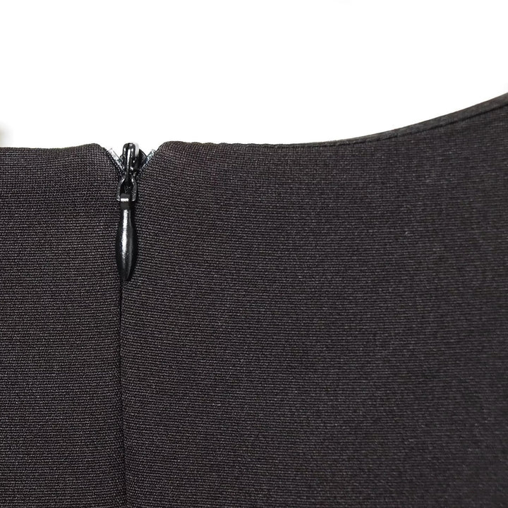 Damen elegantes Kleid mit Schulterpolstern und zeitlosem Design Echo Archiv