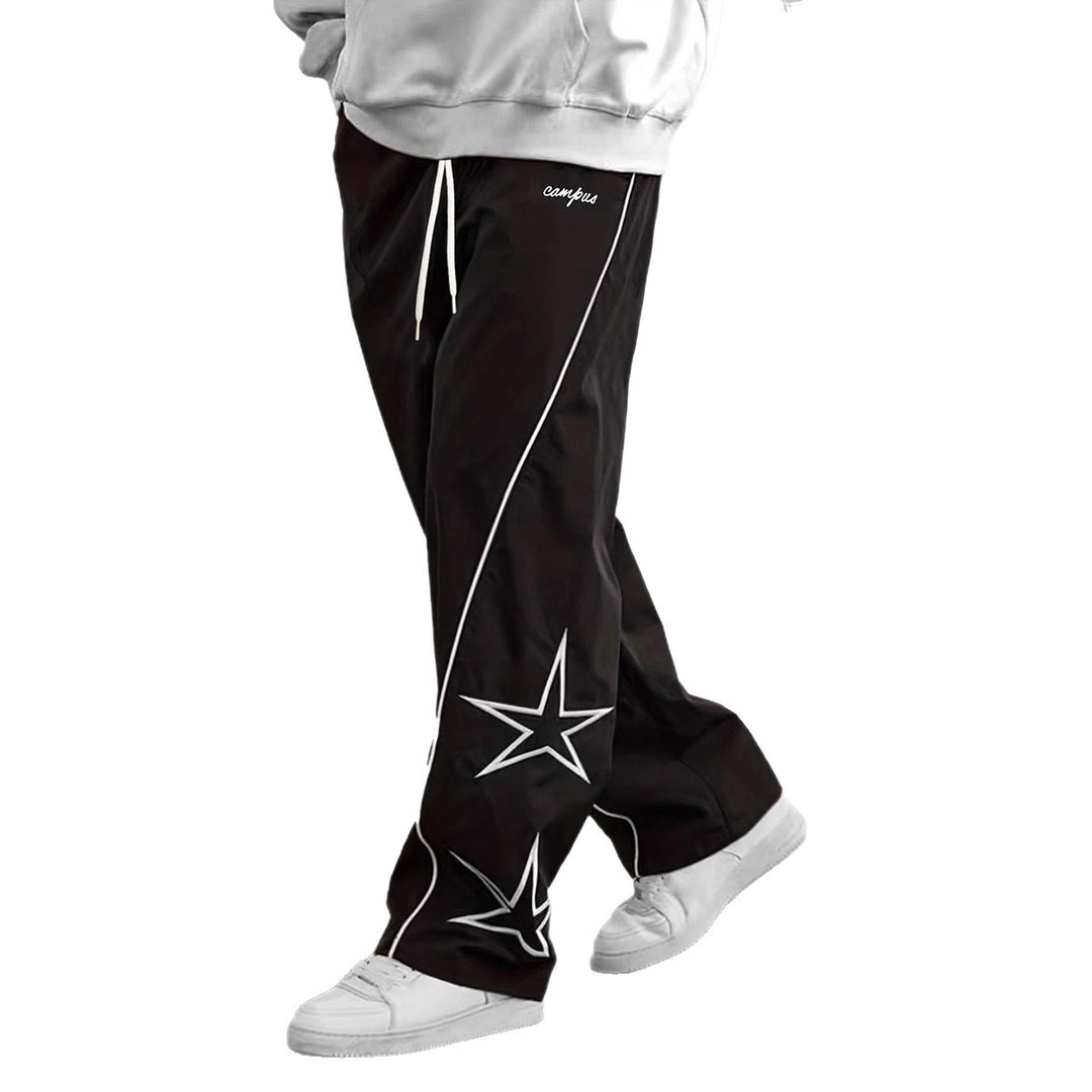 Herren Weite Trackpants mit Kontrastpaspel, Kordelzug und Sternapplikation Echo Archiv