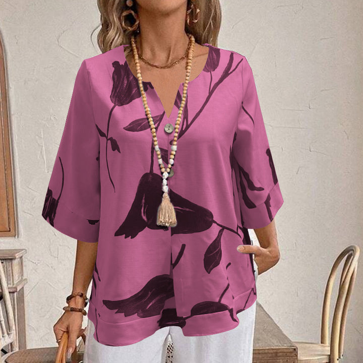 Damen Freizeit Tunika Bluse mit V-Ausschnitt, Schlitzknopf, Dreiviertelärmeln und floralem Oversize-Druck – Élovi