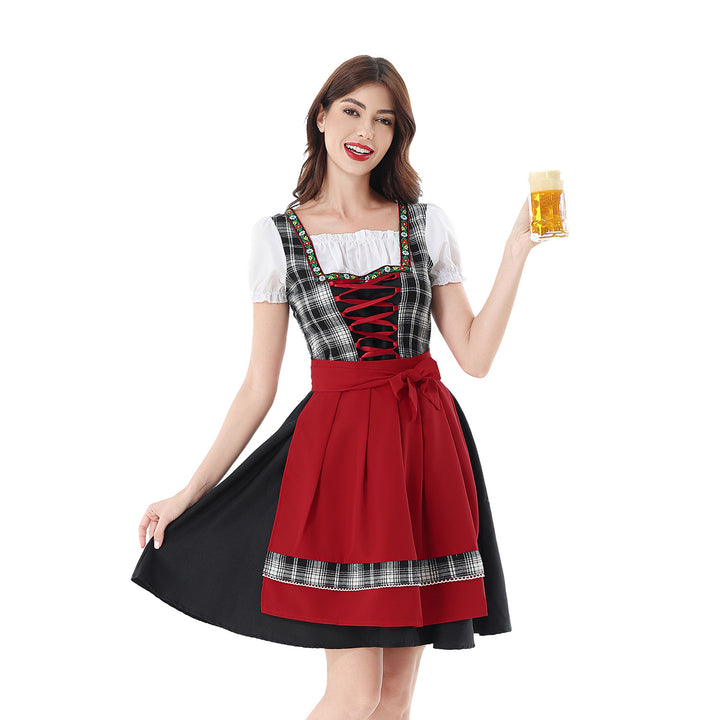 Damen nan traditionelles Dirndlkleid mit Karo-Mieder und gesteppter Schürze Echo Archiv