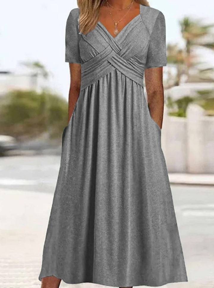 Damen nan fließendes Maxikleid mit gekreuzter Passe V-Ausschnitt Kurzarm und Eingrifftaschen Echo Archiv