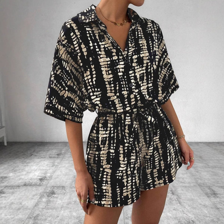 Damen Kurzärmliger Jumpsuit mit floralem Print und Taillengürtel Echo Archiv
