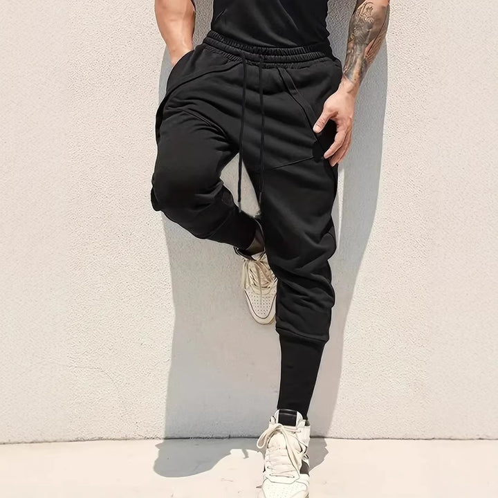 Herren Tapered-Jogginghose mit tiefem Schritt, elastischem Bund & diagonalgesetzten Taschen Echo Archiv