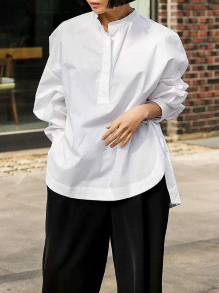Damen Boxy-Baumwollbluse mit breitem Kentkragen und legerer Passform Echoarchiv