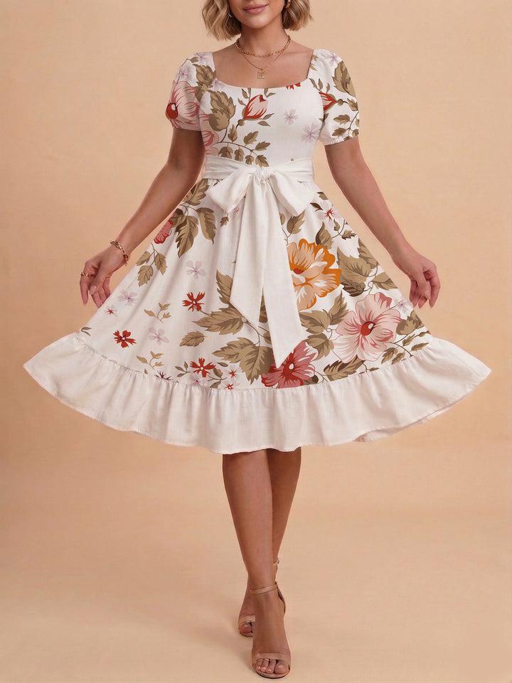 Damen Sommerliches Blumenkleid mit taillierbarem Gürtel und voluminösen Ärmeln Echo Archiv