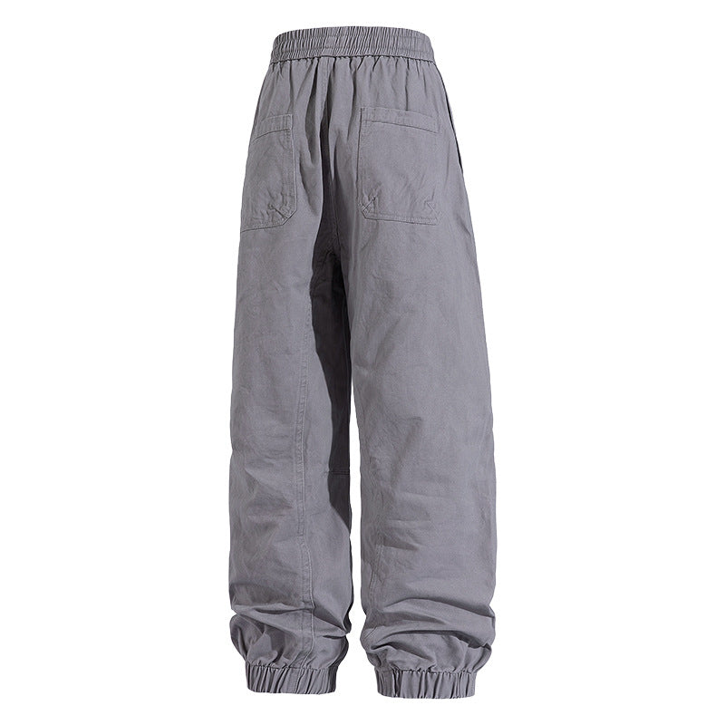 Herren Oversized Utility-Jogginghose aus robustem Baumwollmix mit Kordelbund, seitlichen Cargo‑Taschen & gerippten Bündchen Echoarchiv