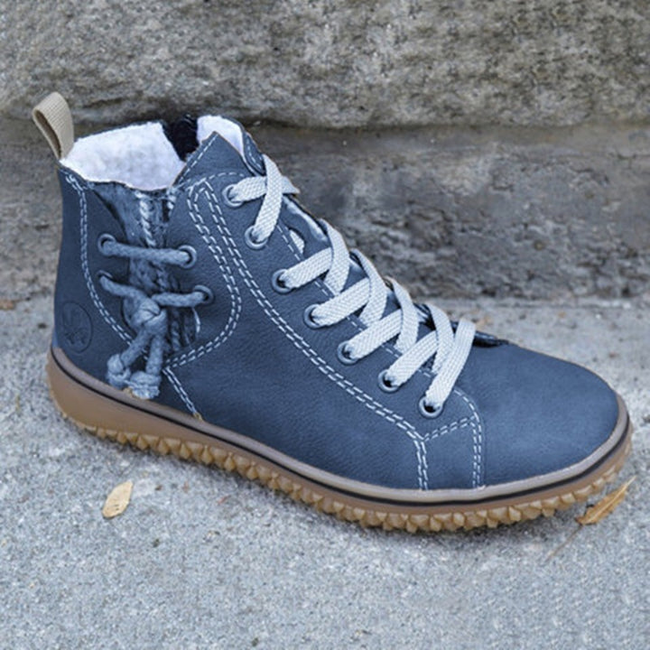 Damen High-Top Sneaker-Boot mit seitlichem Reißverschluss, dekorativem Knöchelriemen und profilierter Gummisohle Echo Archiv