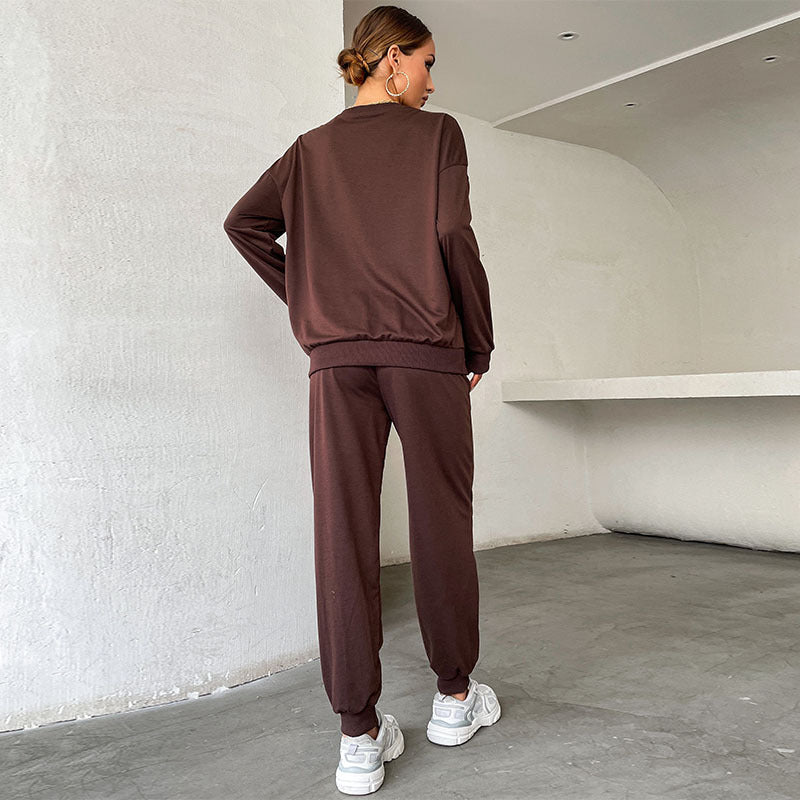 Damen Lässiges Sweatset im College‑Look mit Oversize‑Sweatshirt und Jogginghose Echoarchiv
