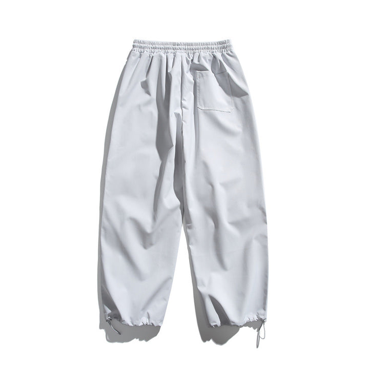 Unisex Technische Cargo-Joggerhose mit elastischem Bund, Reißverschlusstasche und Kordelzug Echoarchiv