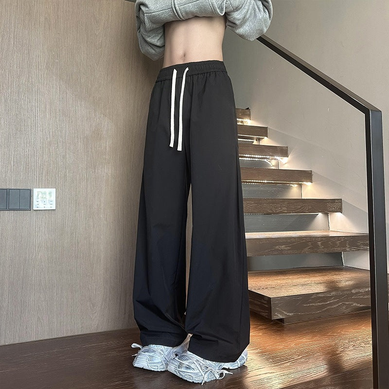 Damen Weit geschnittene Loungehose mit hohem Elastikbund und Kordelzug Echo Archiv