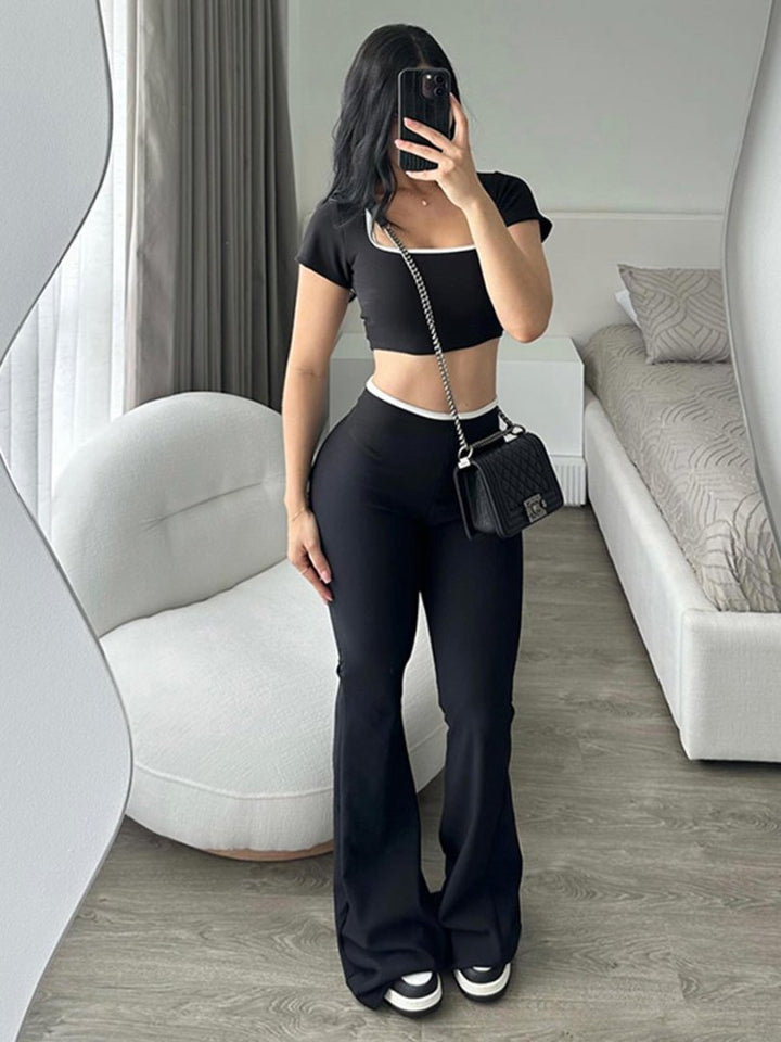 Damen modisches Crop-Top mit tailliertem Schnitt und weiter Hose Echo Archiv