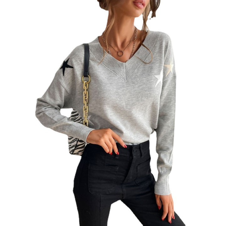 Damen Feiner V‑Ausschnitt Strickpullover mit Stern‑Intarsien und überschnittener Schulter Echoarchiv