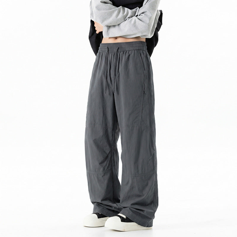 Herren Weite Baggy‑Hose mit Tunnelzugbund und Paneel‑Konstruktion Echo Archiv