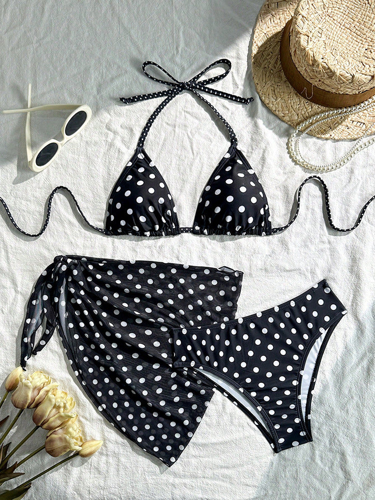 Damen Triangel-Bikini mit verspieltem Polka-Dots-Muster und ergänzt durch einen eleganten Wickelrock Echo Archiv