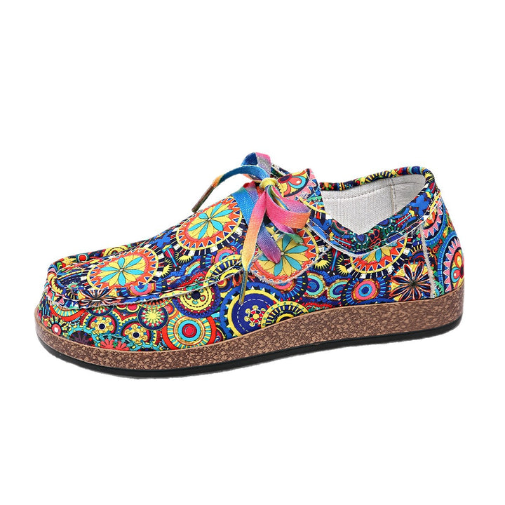 Damen Bequeme Plateau-Slipper im Ethno‑Print mit Korkoptik‑Sohle Echo Archiv