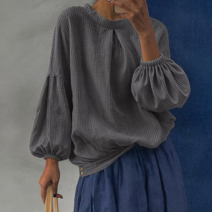 Damen Oversize Waffelstrickpullover mit Ballonärmeln und Kellerfalte Echoarchiv