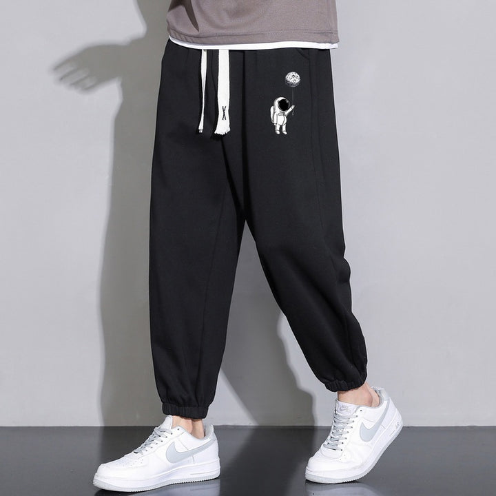 Herren Lockere Jogginghose mit Astronauten-Print, Kordelzugbund und elastischen Saumbündchen Echo Archiv