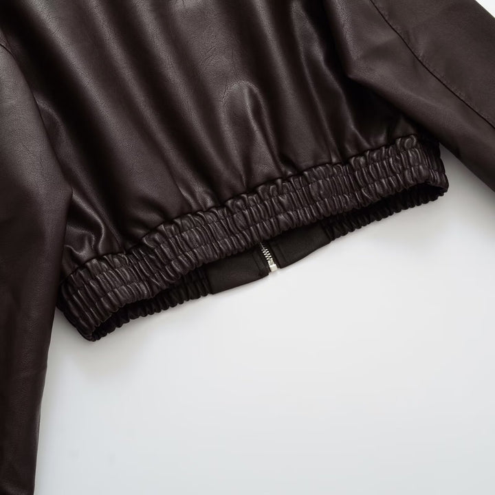 Damen Kurze Boxy-Bomberjacke aus veganer Lederoptik mit Hemdkragen und elastischem Bund Echoarchiv