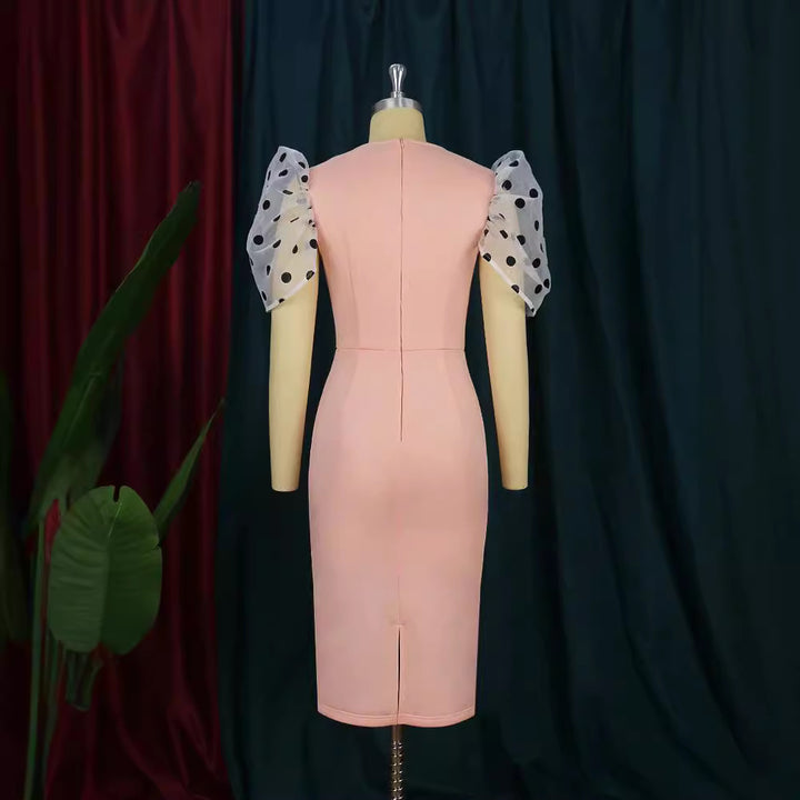 Damen Figurbetontes Kleid mit transparenten Puffärmeln Echo Archiv