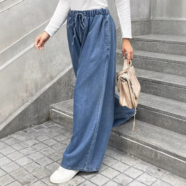 Damen Relaxte Palazzohose aus Denim mit Tunnelzugbund, Eingrifftaschen und extra weitem Bein Echo Archiv