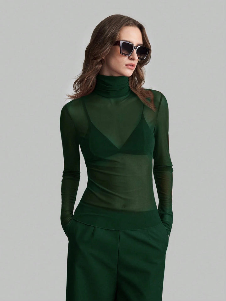 Damen Transparente Turtleneck-Bluse mit figurformendem Schnitt Echoarchiv