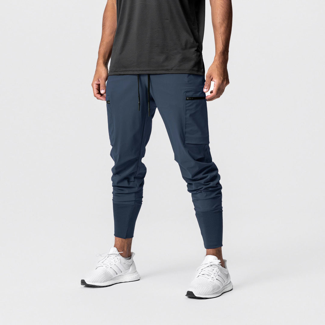 Herren Multifunktionale Sporthose mit seitlichen Reißverschlusstaschen und elastischem Bund Echoarchiv