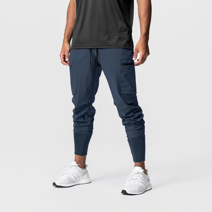 Herren Multifunktionale Sporthose mit seitlichen Reißverschlusstaschen und elastischem Bund Echoarchiv