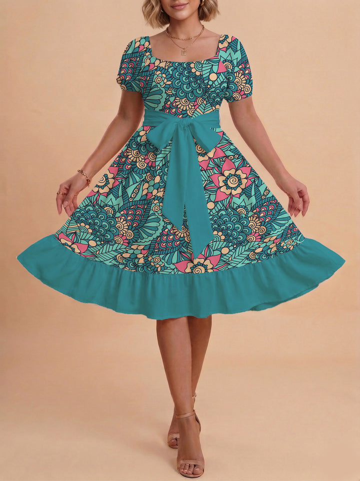 Damen modernes Blumenkleid mit elegantem Taillengürtel und asymmetrischem Saum Echo Archiv