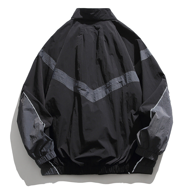 [Unisex] Oversize technische Wind- und Regenjacke mit Stehkragen, reflektierenden Paspeln und elastischem Saum Echo Archiv