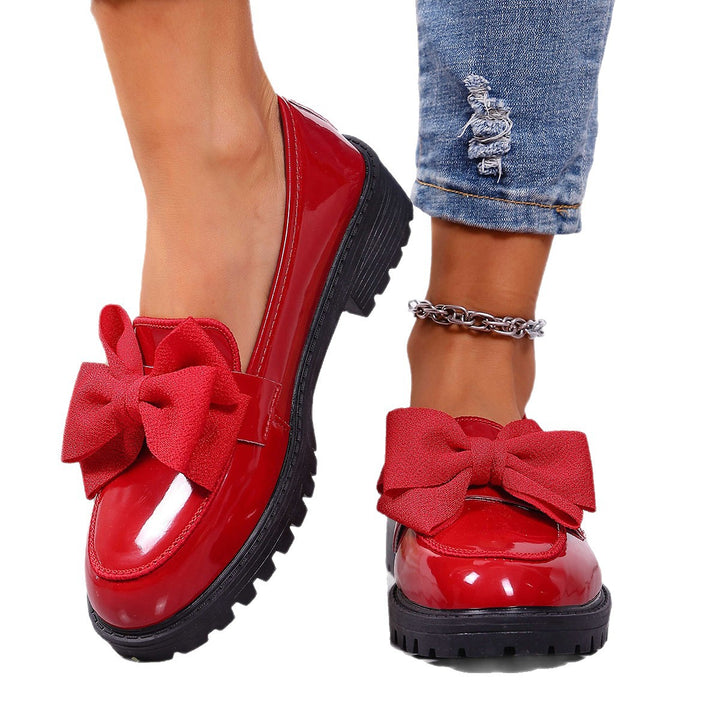 Damen Plateau-Loafer aus Lackimitat mit profilierter Gummisohle und Zierschleife – Lioré