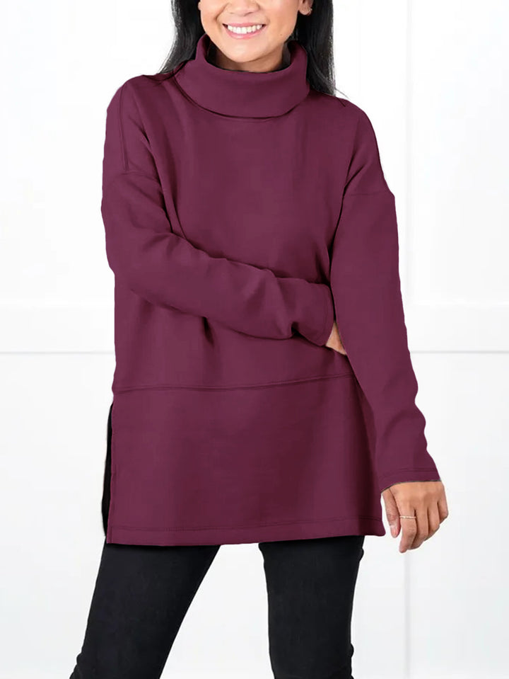 Damen Oversize Sweat-Tunika mit hohem Rollkragen, seitlichen Schlitzen und verlängertem Saum – Avérine