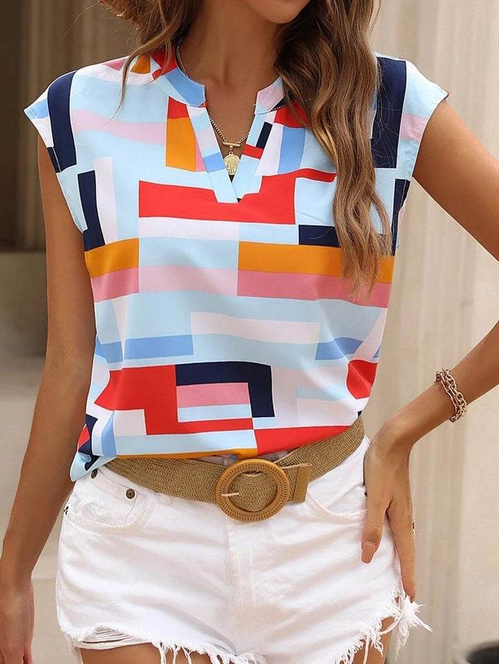 Damen Geometrische Chiffon‑Bluse mit kurzem Cap‑Ärmel und V‑Schlitz Echo Archiv