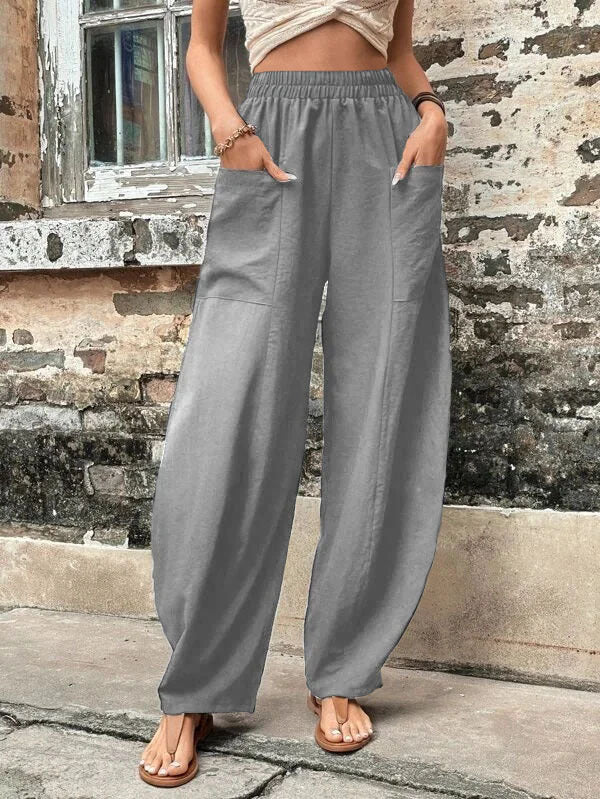 Damen Weite Leinenhose mit elastischem Bund, aufgesetzten Taschen und lässigem Harem-Schnitt Echoarchiv