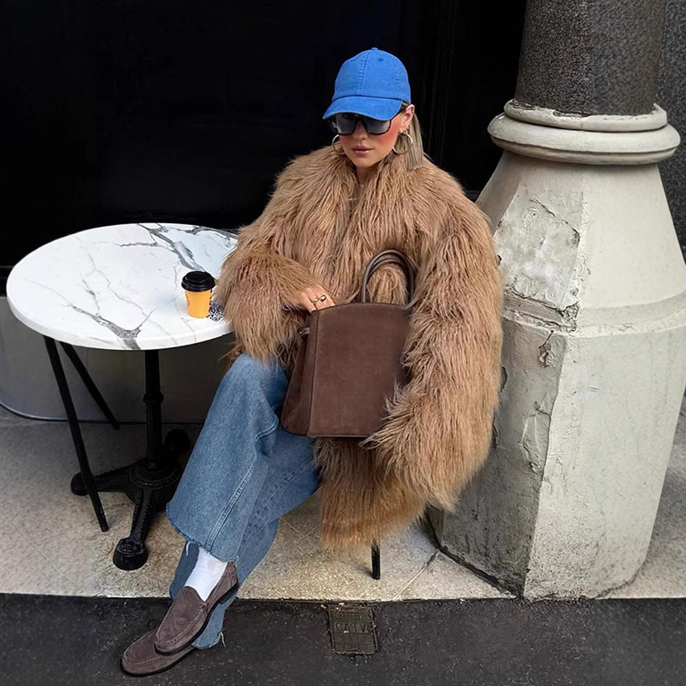 Damen Oversize Shaggy‑Kunstpelz‑Mantel mit langer Florstruktur und verdeckter Knopfleiste Echoarchiv