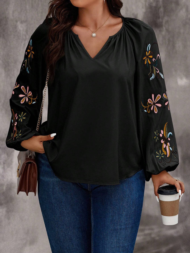 Damen Locker sitzende V-Ausschnitt Bluse mit floraler Stickerei an Ballonärmeln – Élovi