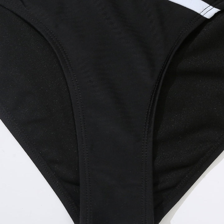 Damen Einteiliger Badeanzug mit stilvollem Farbblock-Design und figurförderndem Schnitt Echo Archiv