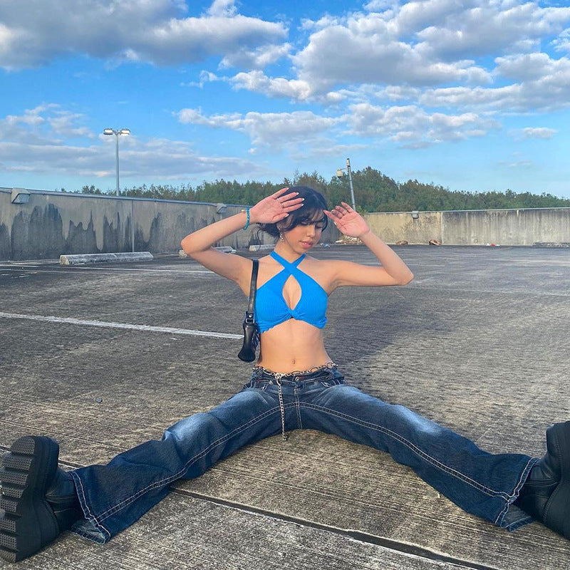 Damen nan tiefsitzende Schlagjeans mit ausgestelltem Bein, dekorativer Metallkette und klassischem Fünf-Taschen-Design Echo Archiv