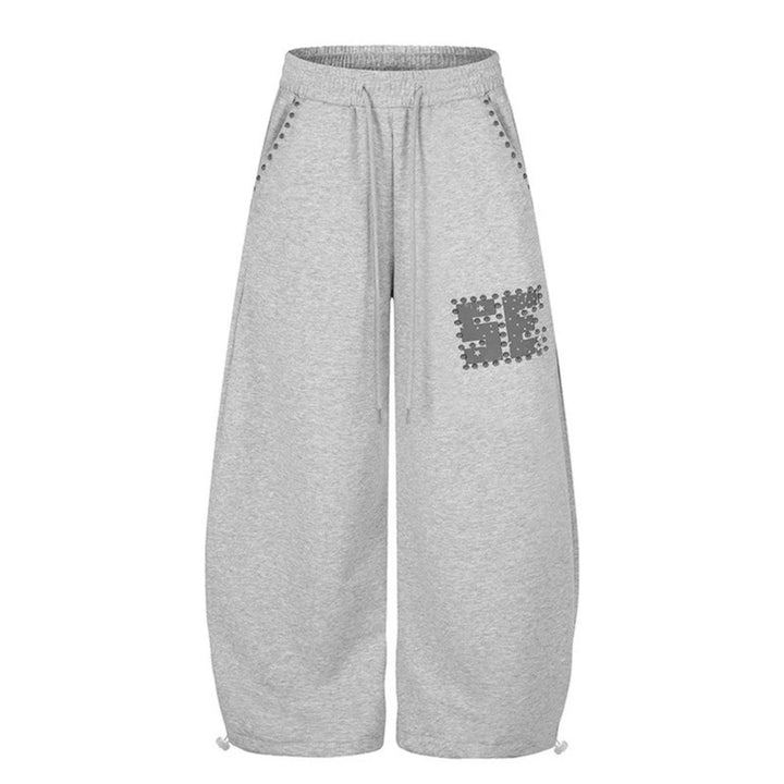 Damen Weite Palazzo-Sweatpants mit Nietenbesatz, Komfortbund und Saumkordel Echoarchiv