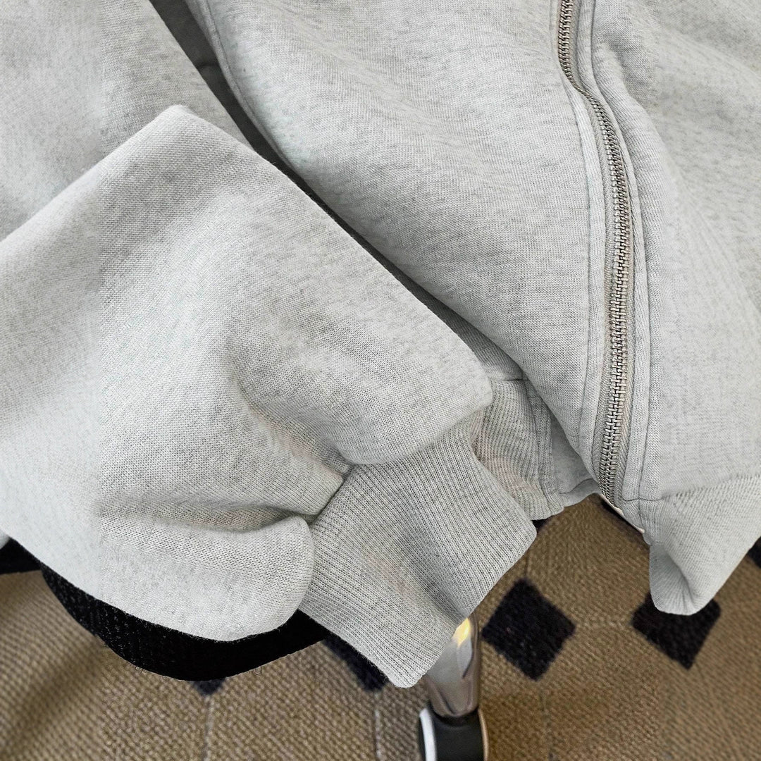Damen Oversized Kapuzenjacke mit asymmetrischem Reißverschluss und Cut-Out-Detail – Avérine