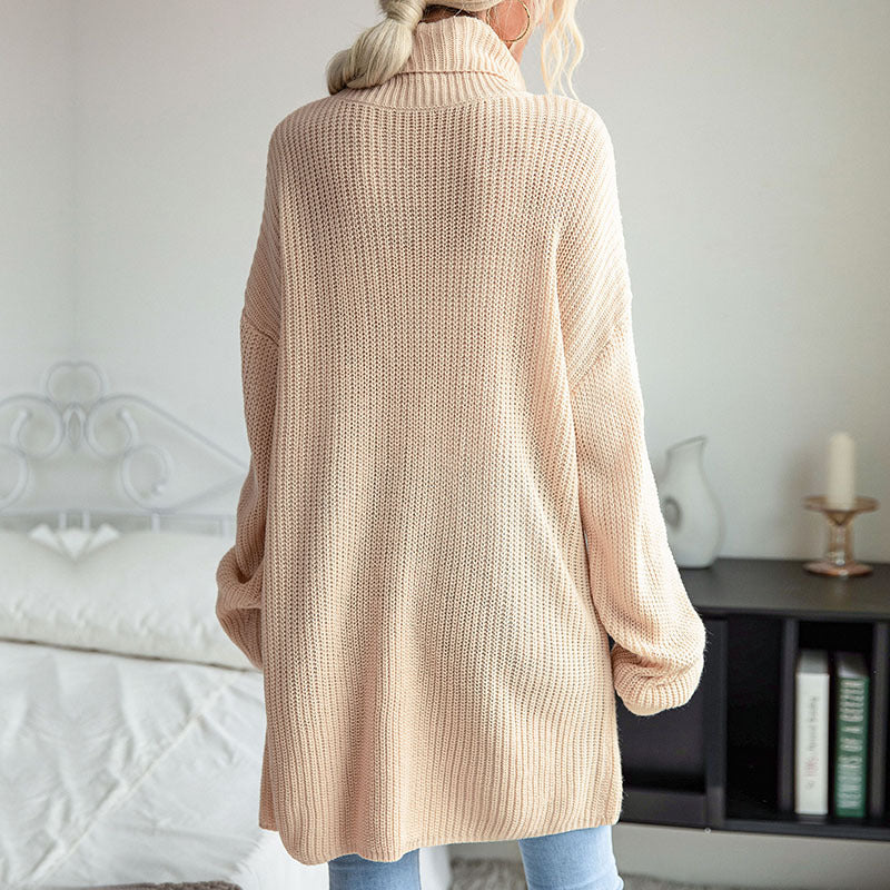 Damen Langer Rollkragen-Strickpullover als Tunika mit hohem Seitenschlitz und Oversize-Ärmeln Echoarchiv