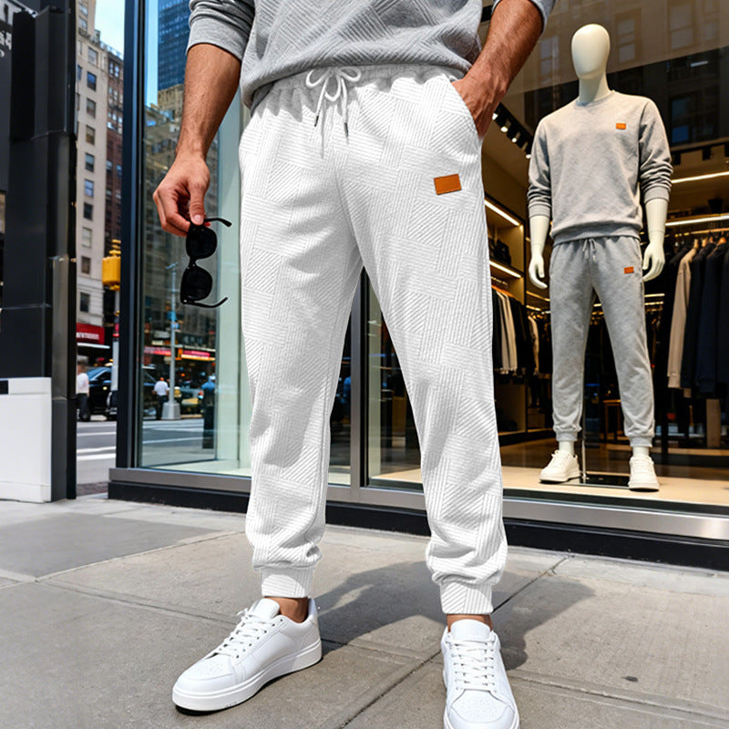 Herren Stepp-Jogginghose mit geometrischem Strukturmuster Echoarchiv