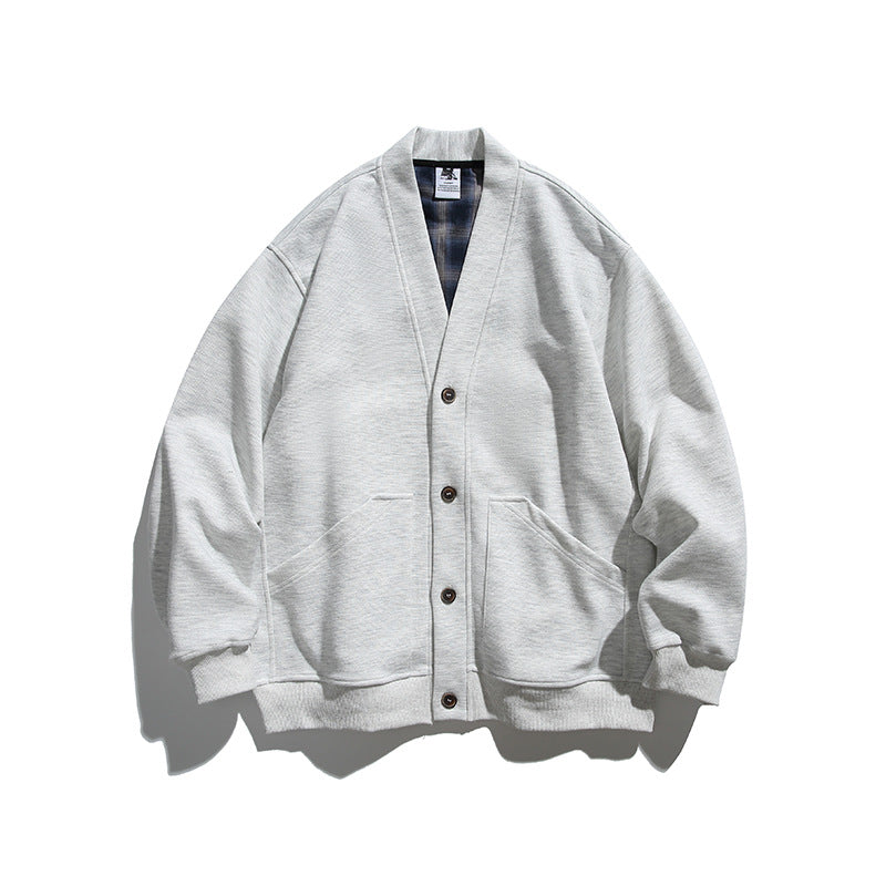 Unisex Boxy-Cardigan-Jacke mit V-Ausschnitt, aufgesetzten Taschen und kariert gefüttertem Innenfutter Echo Archiv