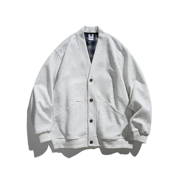 Unisex Boxy-Cardigan-Jacke mit V-Ausschnitt, aufgesetzten Taschen und kariert gefüttertem Innenfutter Echo Archiv